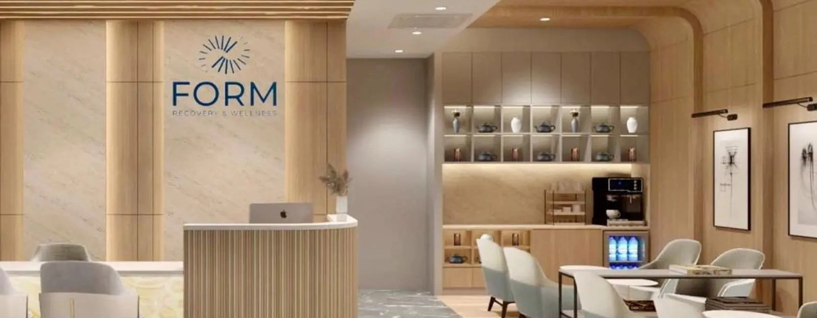 Modern wellness clinic reception area with FORM Recovery branding and contemporary design